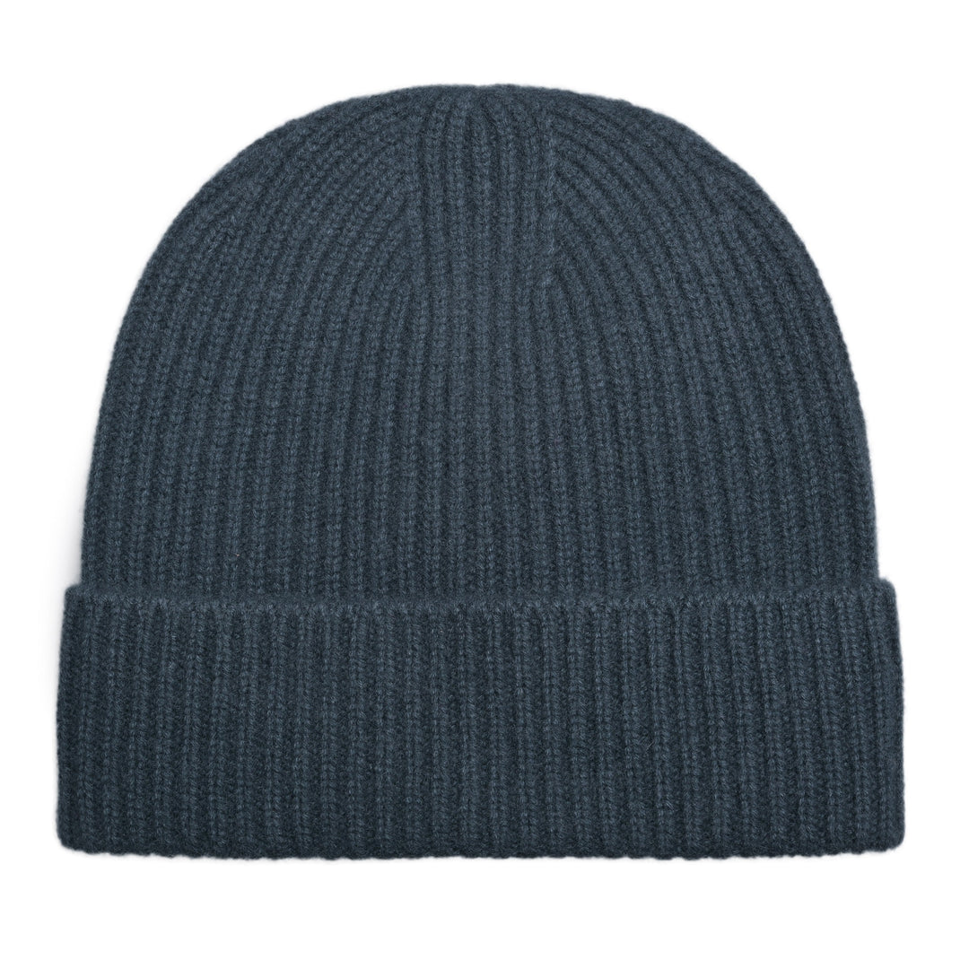 Dunkelblaue Kaschmirmütze mit Aufschlag, 100 % Cashmere, Unisex, Produktaufnahme auf hellem Hintergrund.